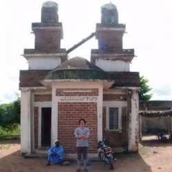 Dustin Lockwood in front of building in Ghana